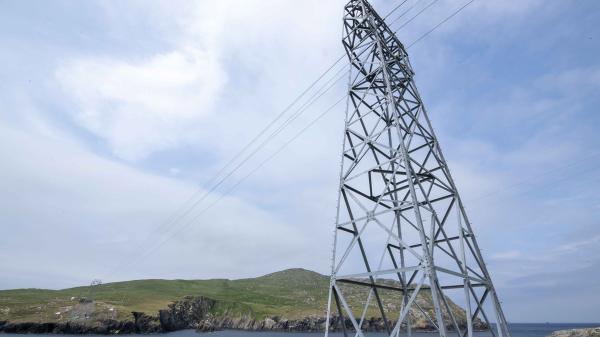 Cable Car Tower with blue sky, Sea and an Island in the background