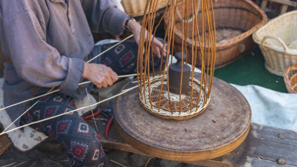 A women making a wicker basket