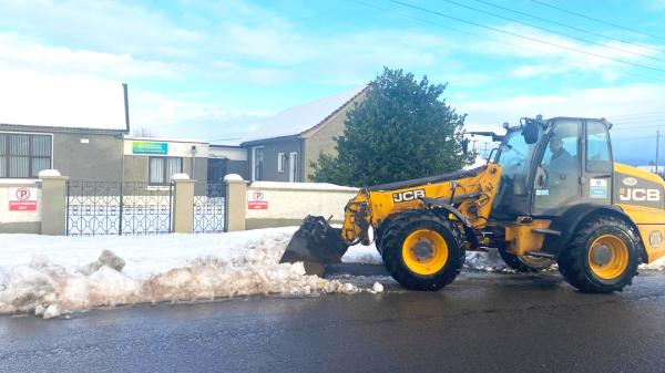 Council machine clearing snow in Charleville