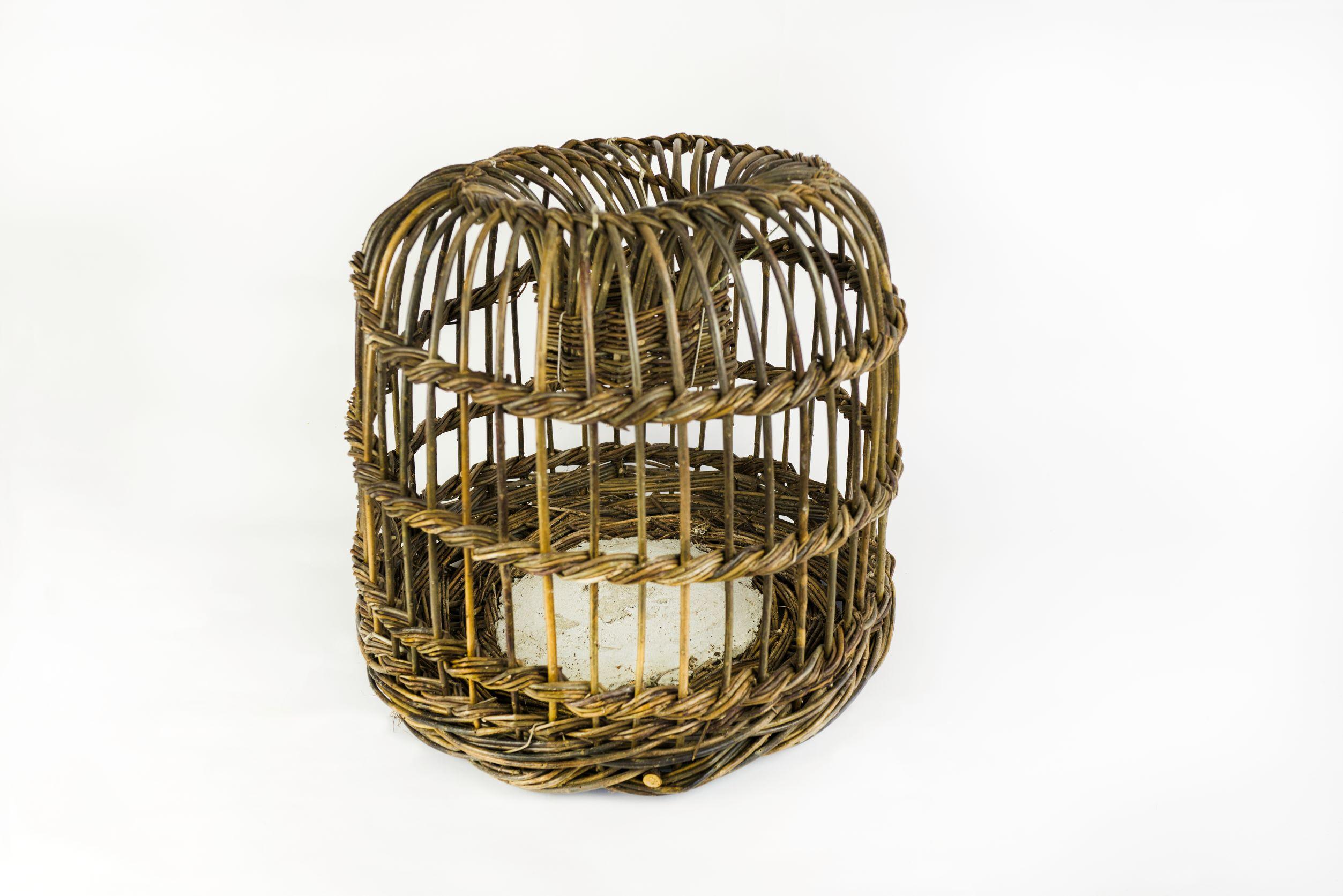 A lobster pot with a white bacground