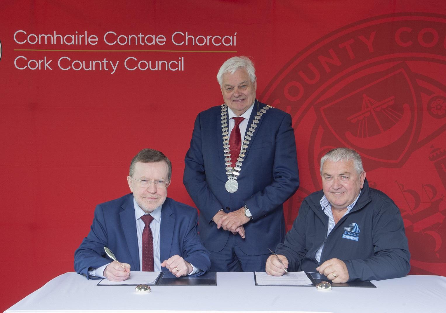 Kevin Morey, Divisional Manager North Cork, Cork County Council, Mayor of the County of Cork, Cllr. Frank O’Flynn and John Buckley, J.D. Buckley Construction Ltd. Cork County Council signing a contract.