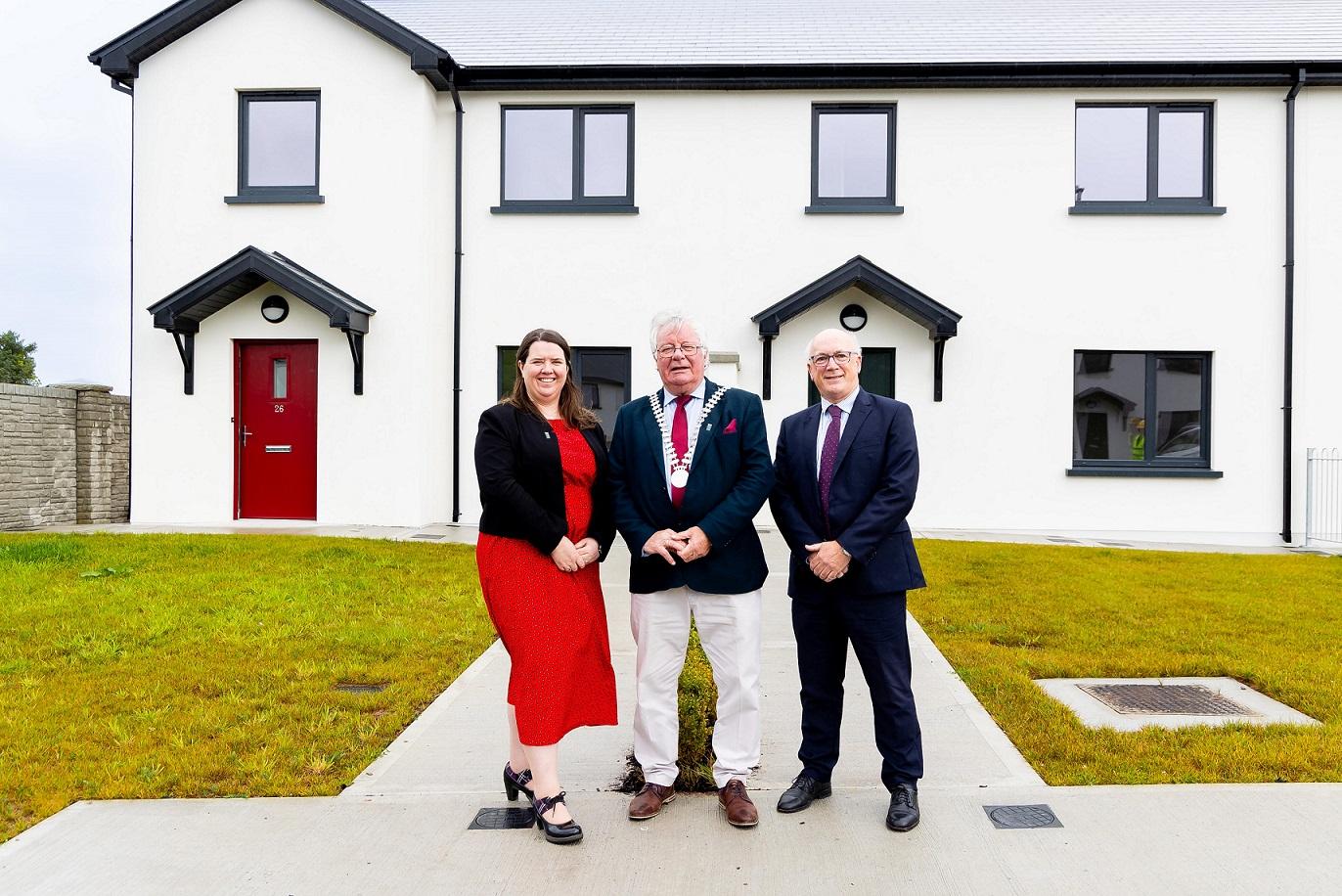 Loraine Lynch, Divisional Manager, Cork County Council; Mayor of the County of Cork, Cllr. Joe Carroll and Maurice Manning, Director of Services Housing pictured outside one of the cost rental houses.