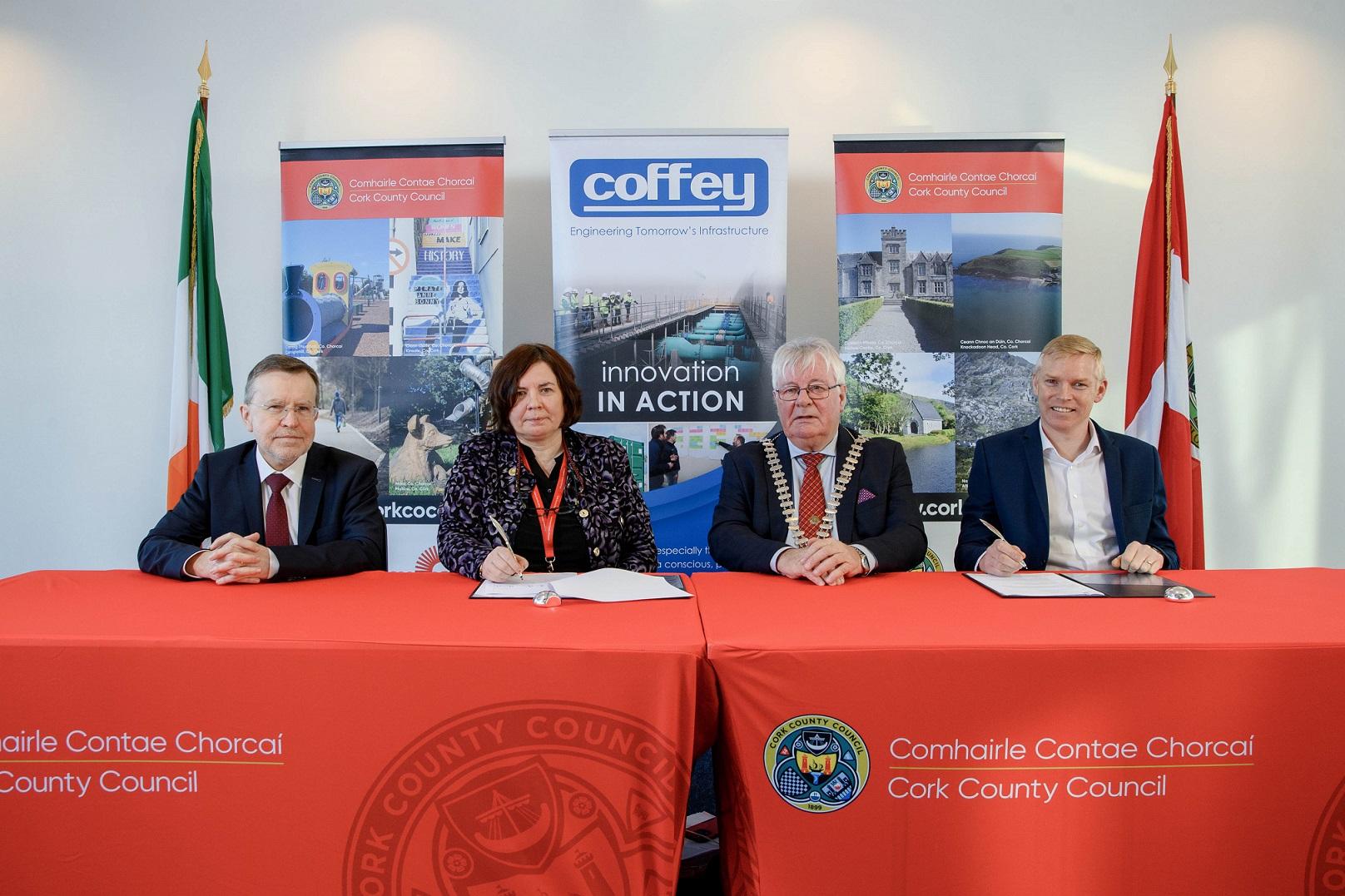 Kevin Morey, Divisional Manager, Cork County Council; Moira Morrell, Chief Executive of Cork County Council;  Mayor of the County of Cork, Cllr. Joe Carroll; Odran Madden, Managing Director, Coffey Construction Ltd signing the contract for the construction phase of the Ringaskiddy Active Travel and Urban Realm scheme.