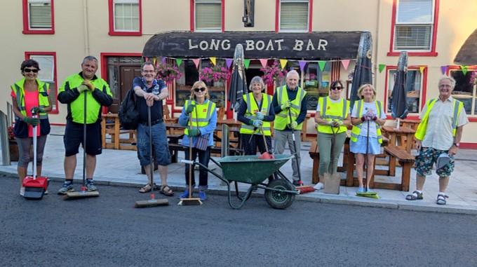 A group of people wearing high vis vests